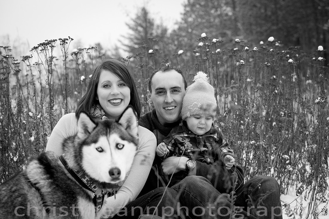 Family winter session at Hartley Nature Center, Duluth MN with husky dog.