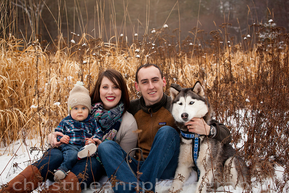 Family winter session at Hartley Nature Center, Duluth MN with husky dog.