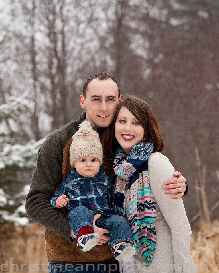 Family winter session at Hartley Nature Center, Duluth MN with husky dog.