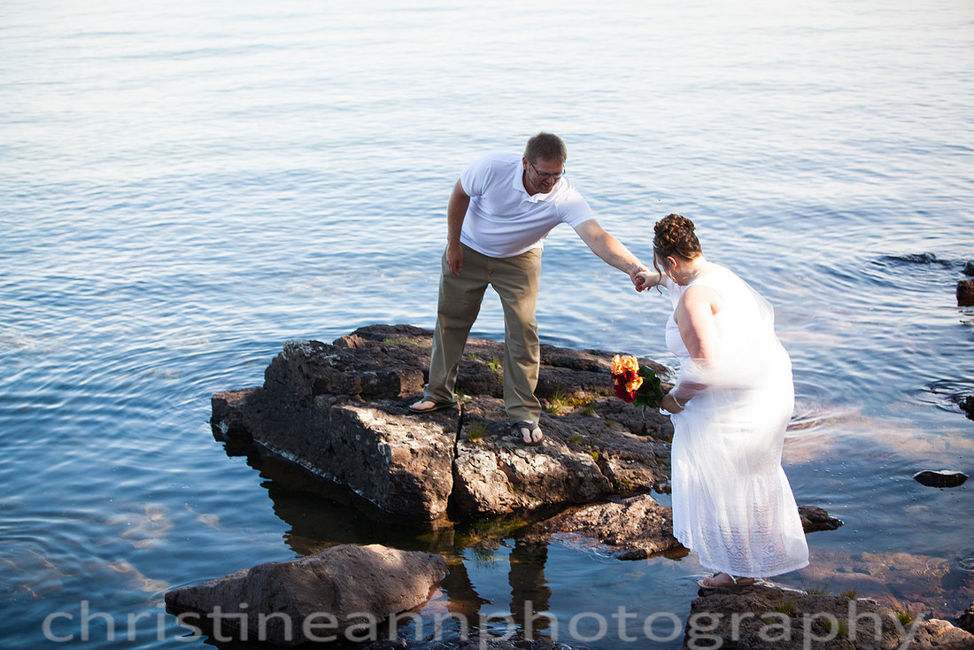 Wedding ceremony at Larsmont Cottags in Duluth MN