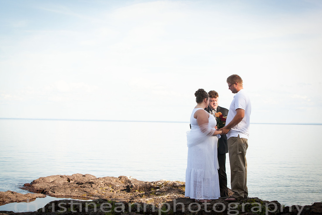 Wedding ceremony at Larsmont Cottags in Duluth MN