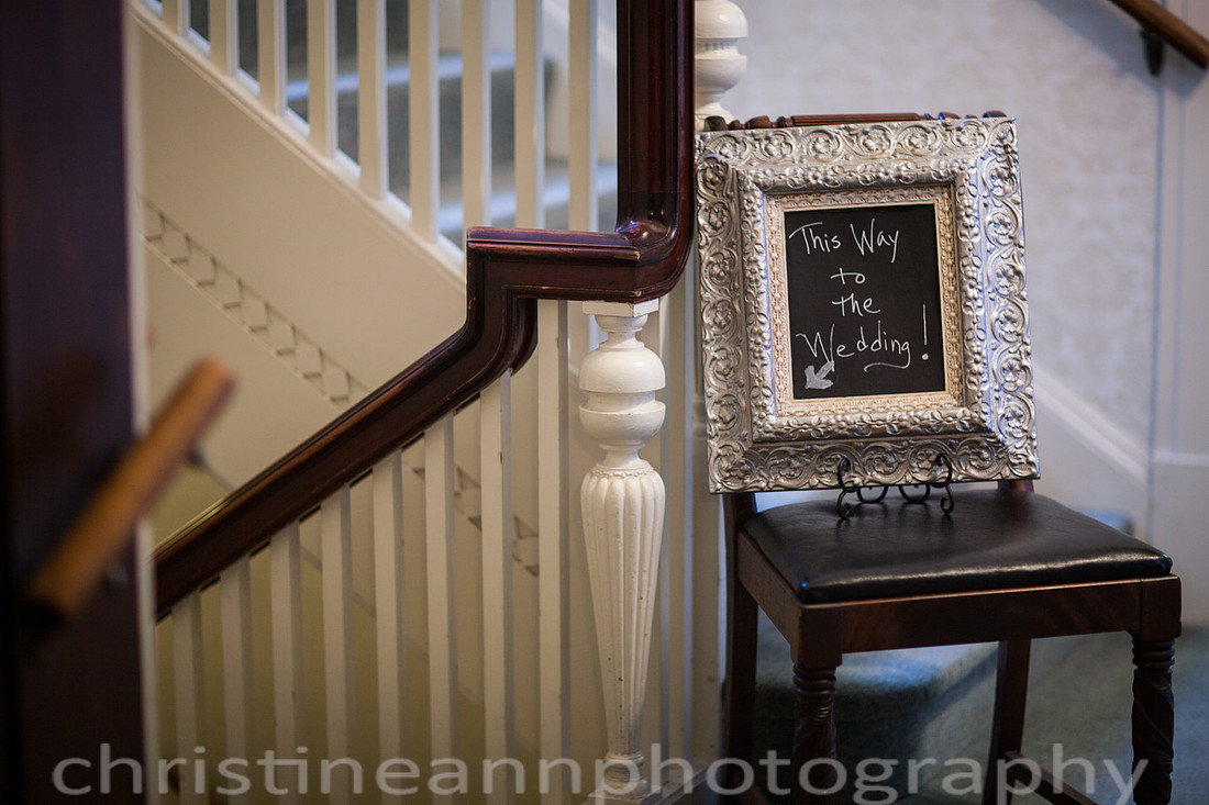 Duluth MN wedding at Womans Club near North Shore Lake Superior with red and white colors.